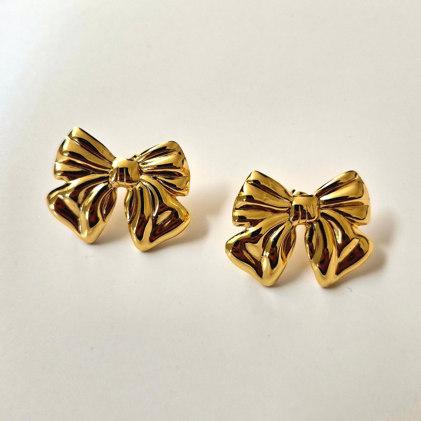 Aretes Moño